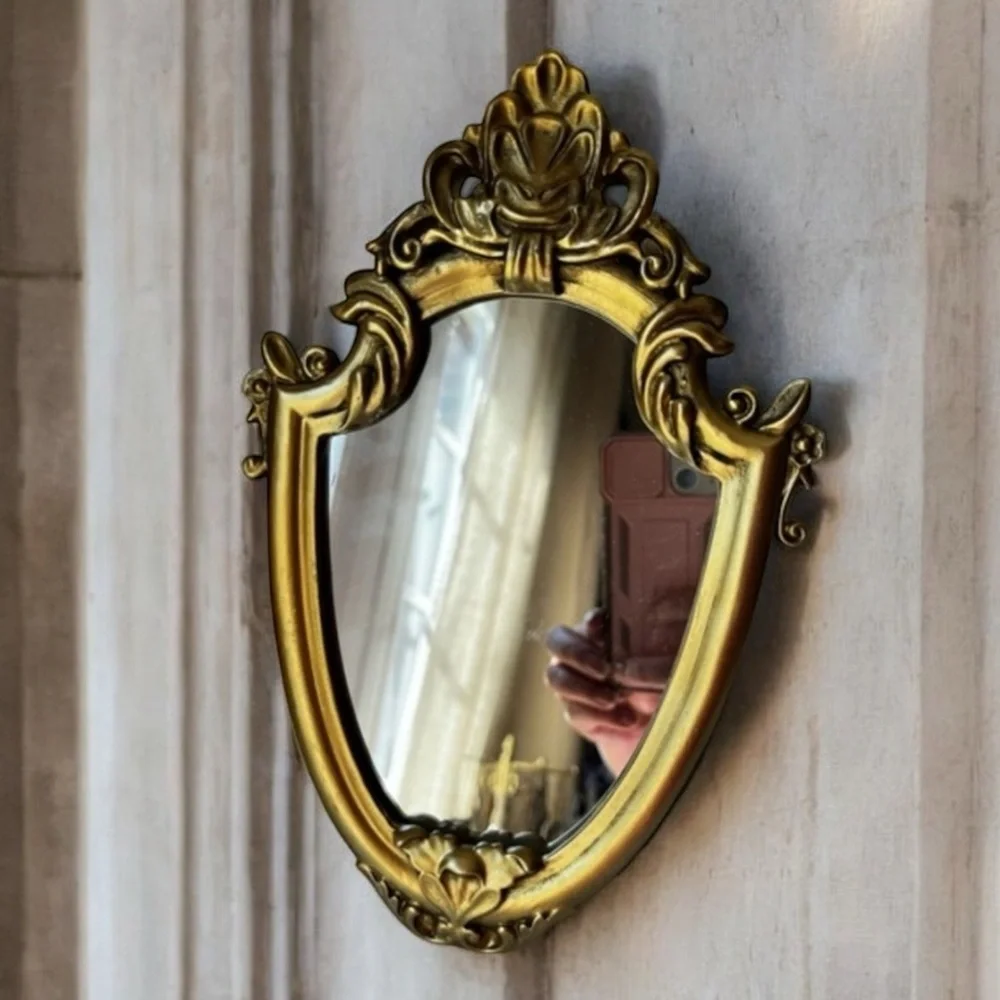 Ornate Gold and Black Decorative Mirror